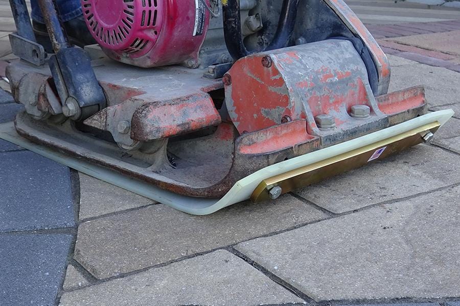 Compactor clearance rubber pad