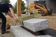 Quick-E-BL850 block clamps picks up to 850 pounds of stone including retaining wall block, step treads and more and includes a fork lift pocket to use with a fork lift